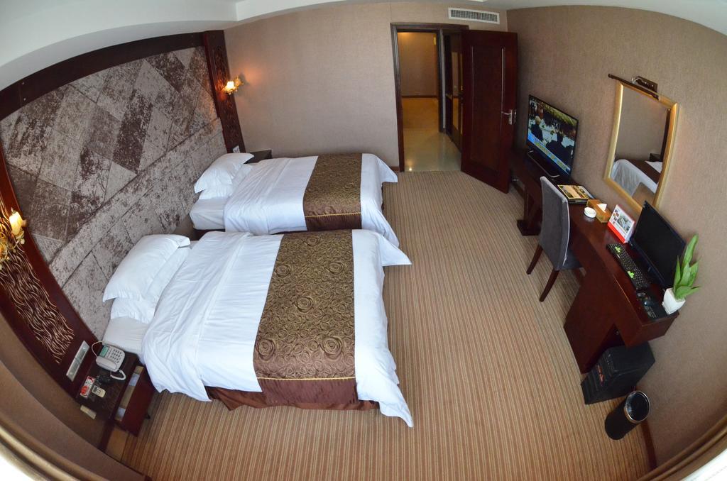 Xiamen Wanjia Oriental Hotel Szoba fotó